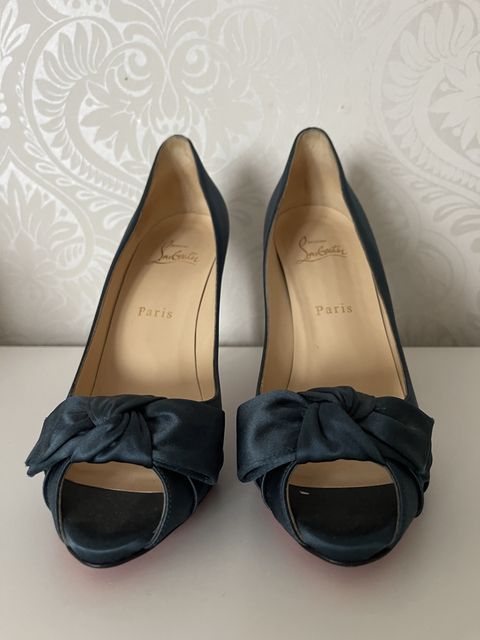 Туфлі Louboutin