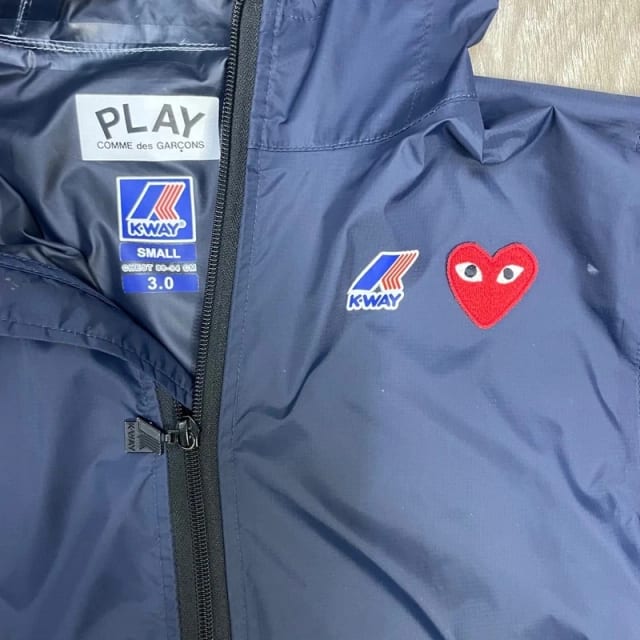 Comme des garçons regnjacka