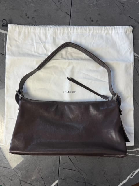 Lemaire Belted Leather Shoulder Bag. Crafted from supple calf leather