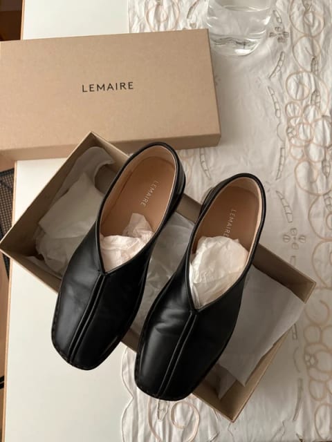 Lemaire black leather piped loafers / slip on flats